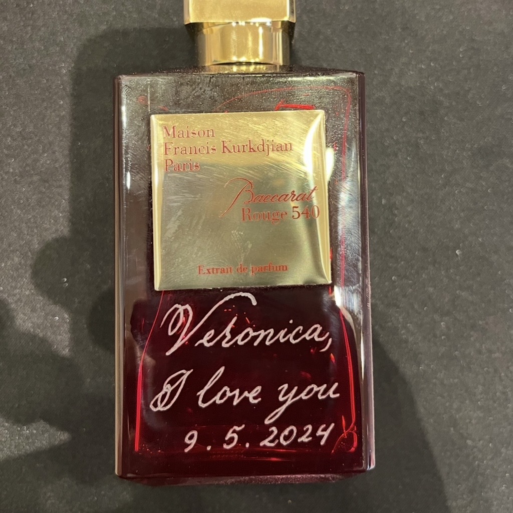 Maison Francis Kurkdjian Baccarat Rouge 540 fragrance bottle engraved with “Veronica, I love you” in calligraphy as a personalized Valentine’s Day gift for her.