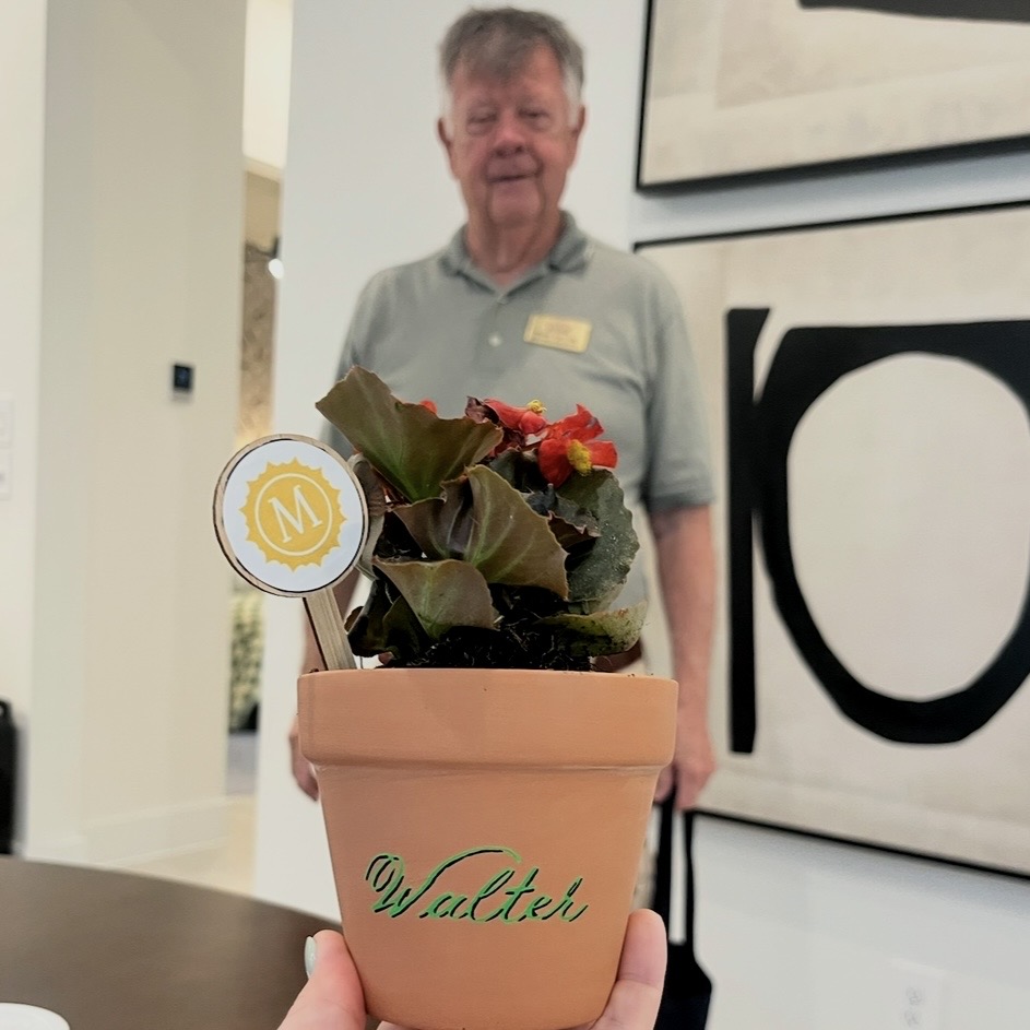 Personalized terra cotta pot with name Walter in green calligraphy at Houston live event