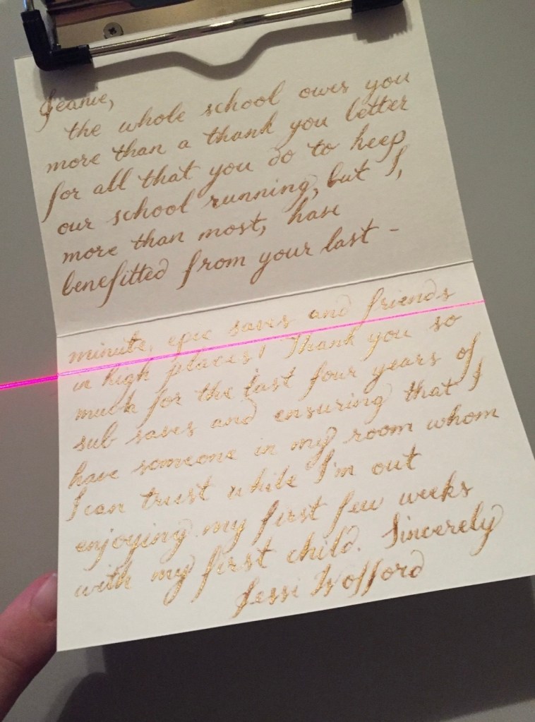 Handwritten thank you note written in pointed pen calligraphy on cream stationery.
