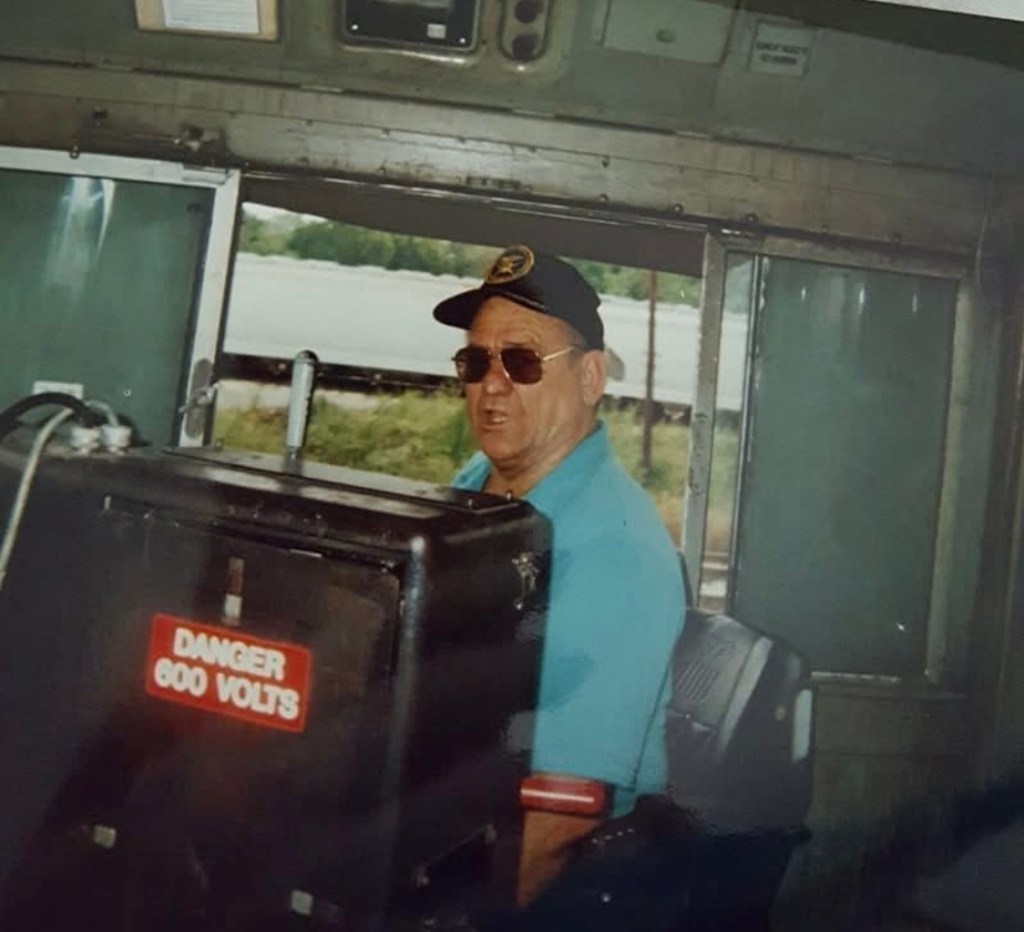 My grandfather, Milton Gautney, working as a train engineer during his railroad career.
