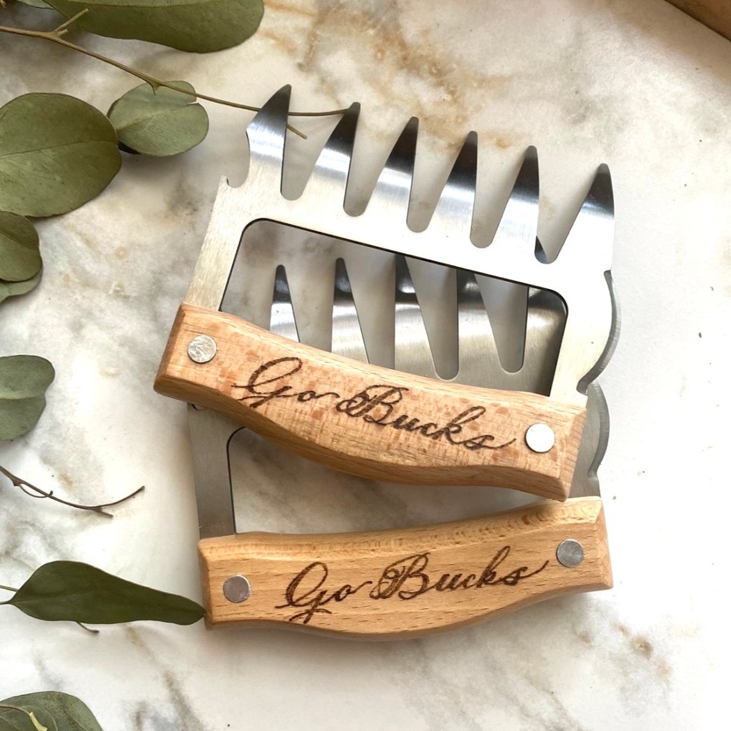 Wood-handled meat shredding bear claws personalized with custom wood-burned lettering as an example of a unique closing gift.